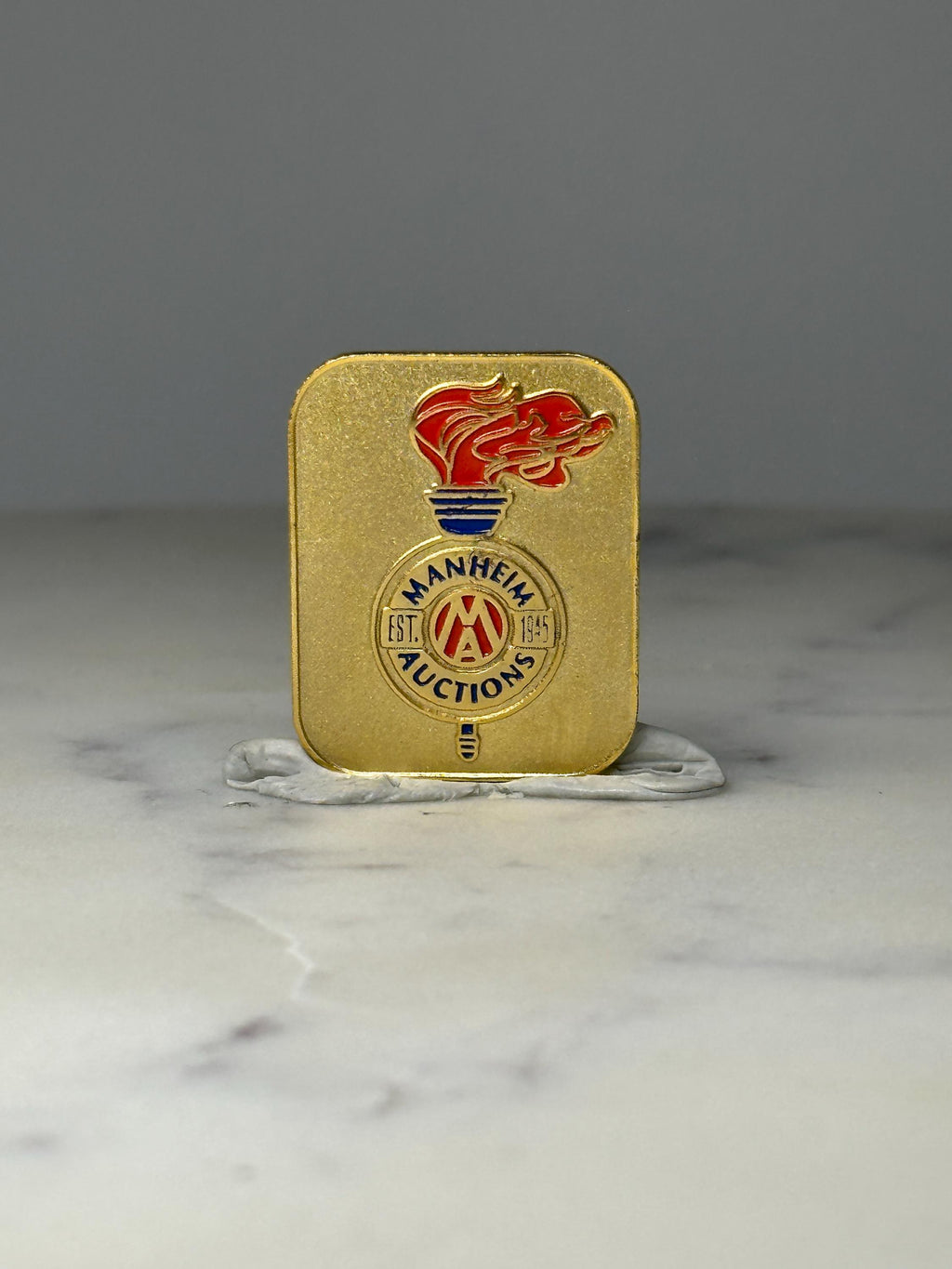 Manheim Auctions Enamel Pin: Gold Tone Torch - Est 1945