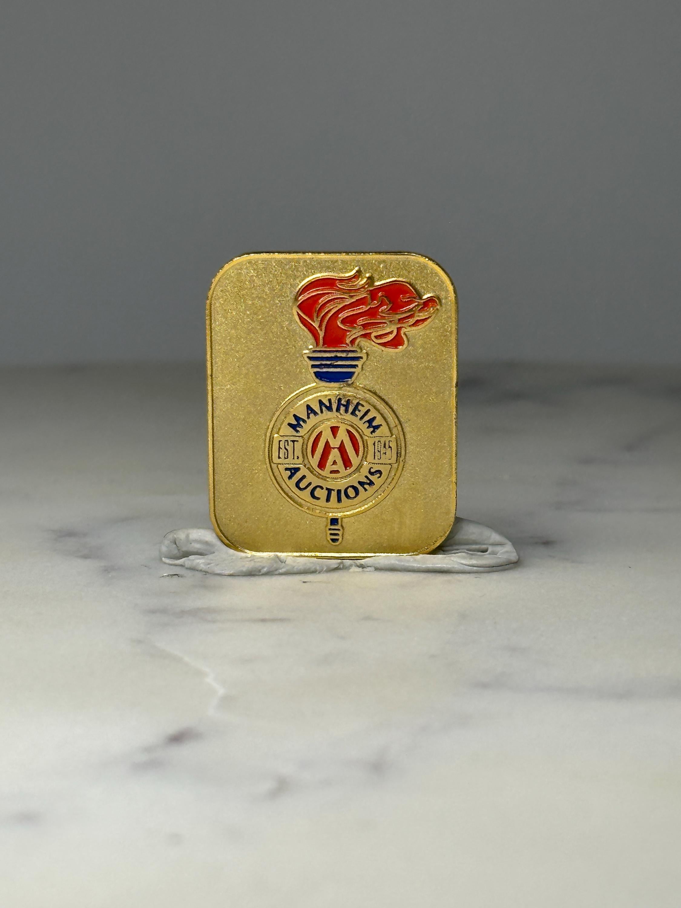 Manheim Auctions Enamel Pin: Gold Tone Torch - Est 1945