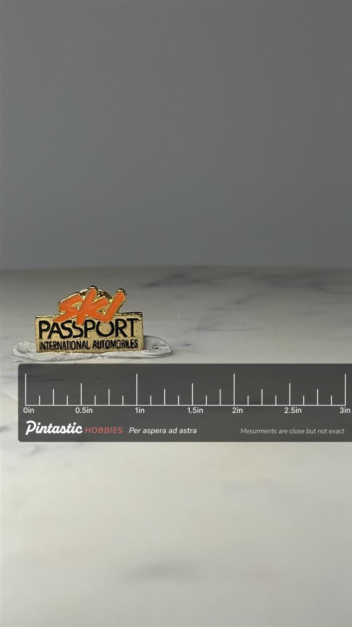 Vintage Ski Passeport Automobiles Internationales Quebec Enamel Lapel Pin with ruler overlay for size reference