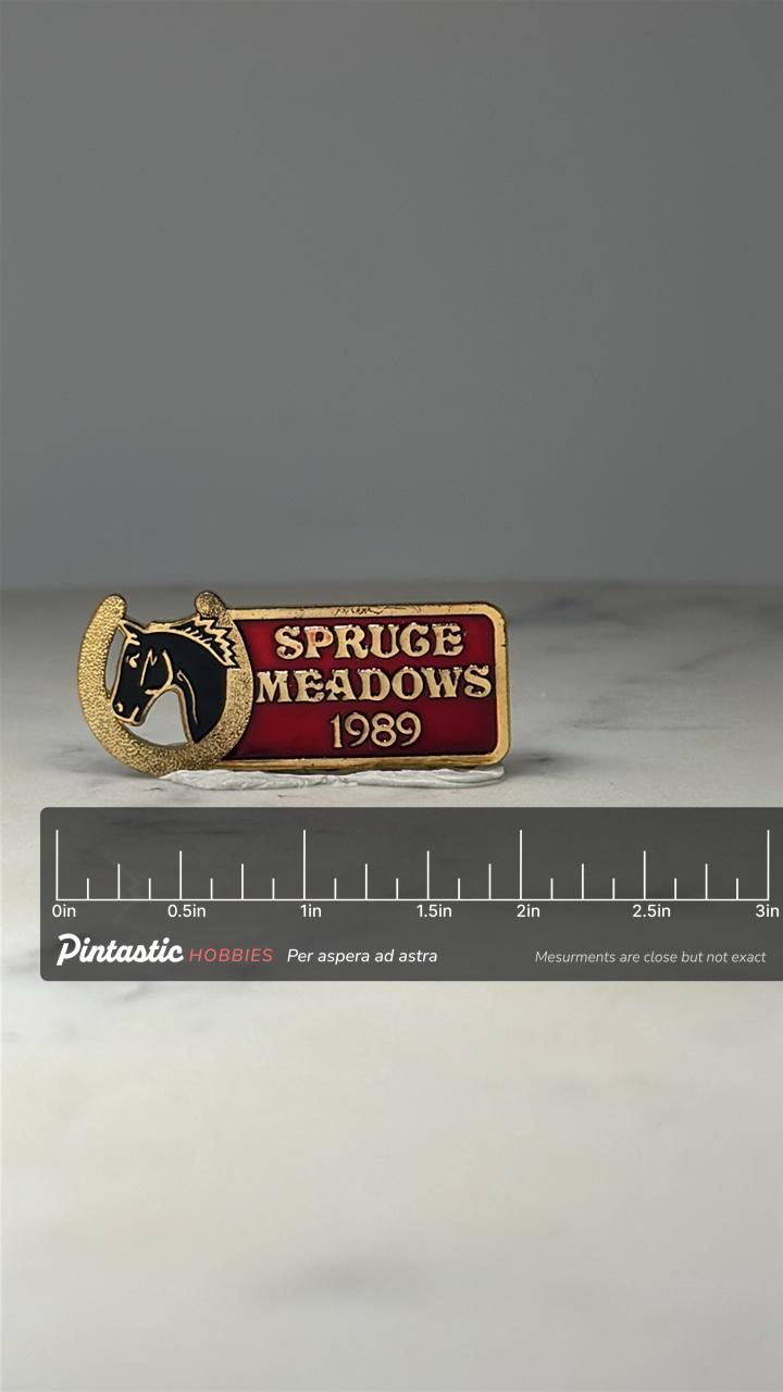 Spruce Meadows Horse Pin: Red & Gold Enamel - 1989 Equestrian with ruler overlay for size reference