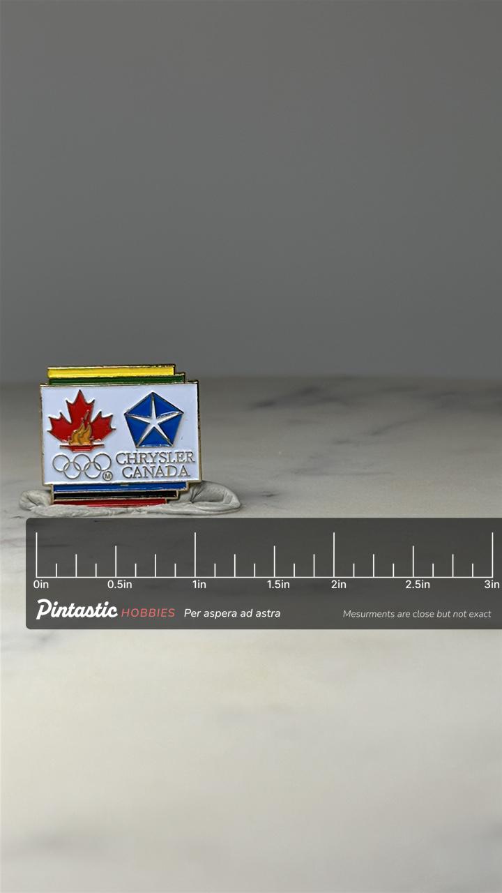 Chrysler Canada Olympic Pin: Enamel Maple Leaf - 1988 Sponsor with ruler overlay for size reference