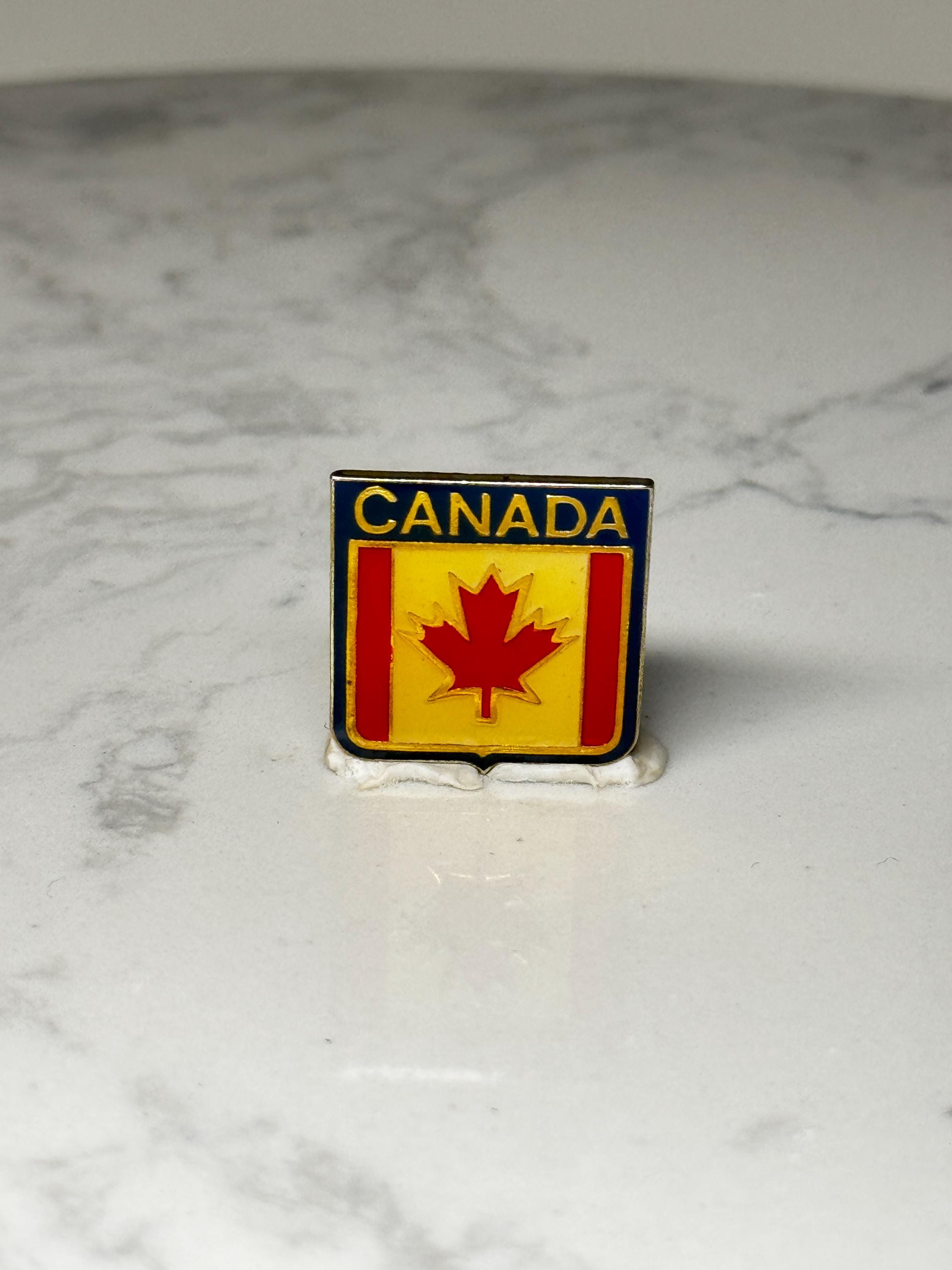 Canada Flag Enamel Pin: Red Yellow Blue Shield - Patriotic Accessory
