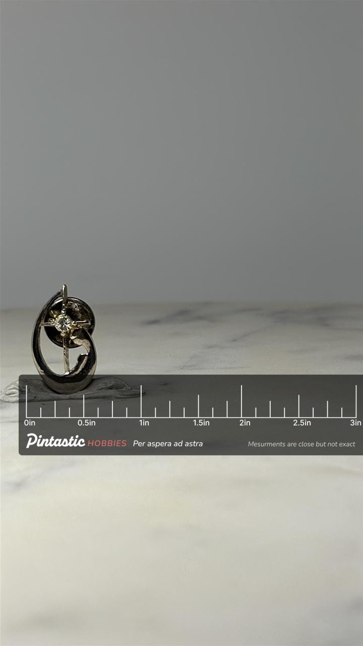 Vintage Virgin Mary and Child Cross Rhinestone Religious Lapel Pin with ruler overlay for size reference