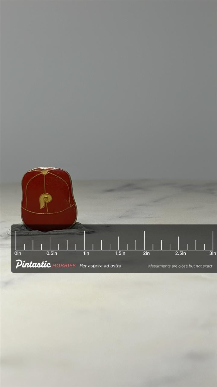Philadelphia Phillies Cap Pin: Red Enamel Gold Tone - Sports Accessory with ruler overlay for size reference