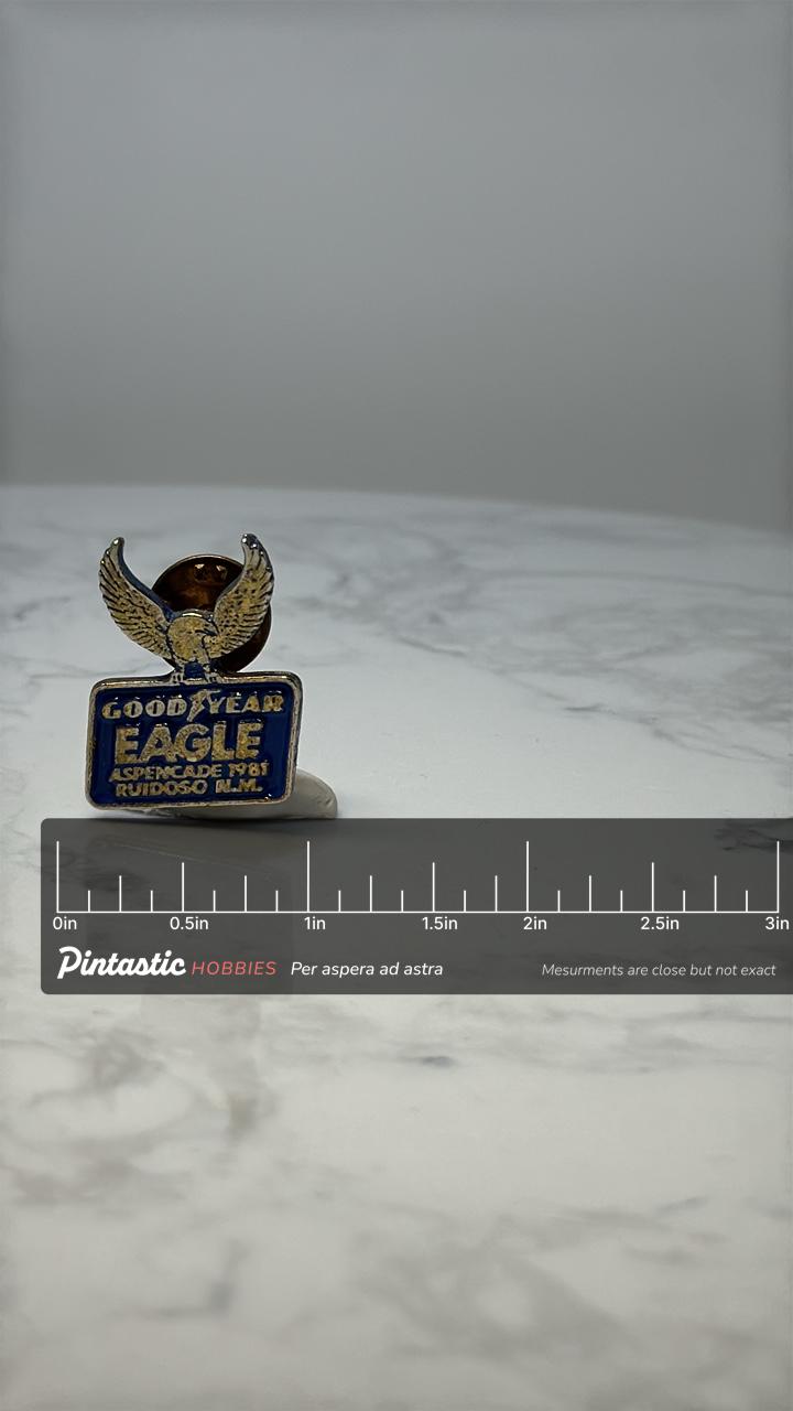 Vintage Goodyear Eagle Pin: Blue Enamel - 1981 Ruidoso Event with ruler overlay for size reference
