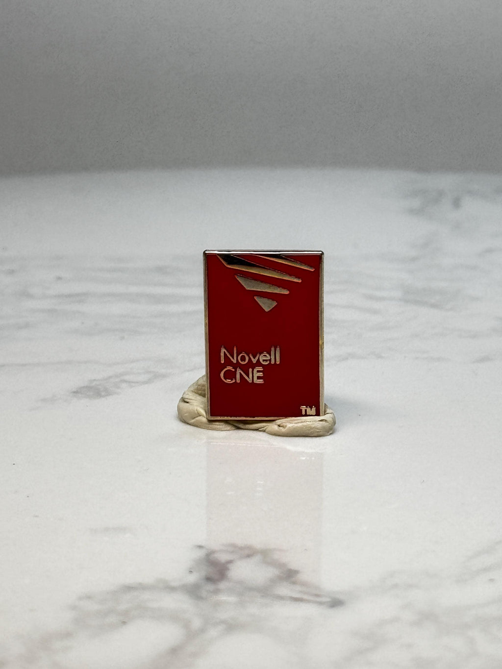 Novell CNE Enamel Pin: Red & Gold Corporate - 1990s Tech Accessory