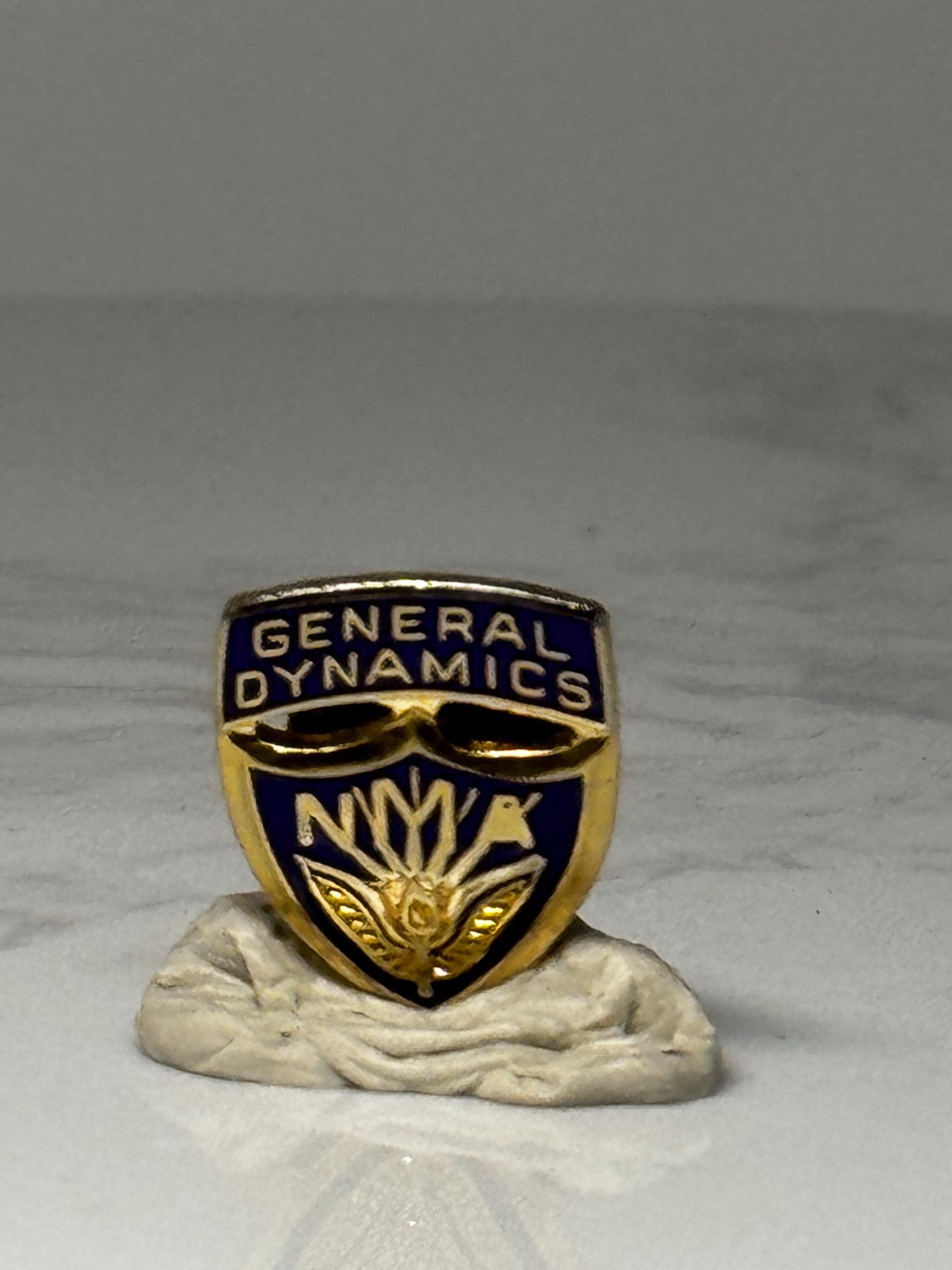 General Dynamics NMA Shield Pin: Blue & Gold Enamel - Corporate