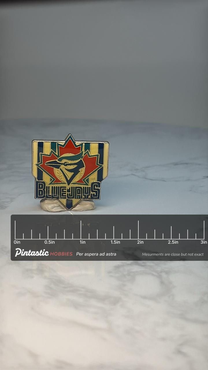 Toronto Blue Jays Enamel Pin: Gold Tone Maple Leaf - 1990s MLB Accessory with ruler overlay for size reference