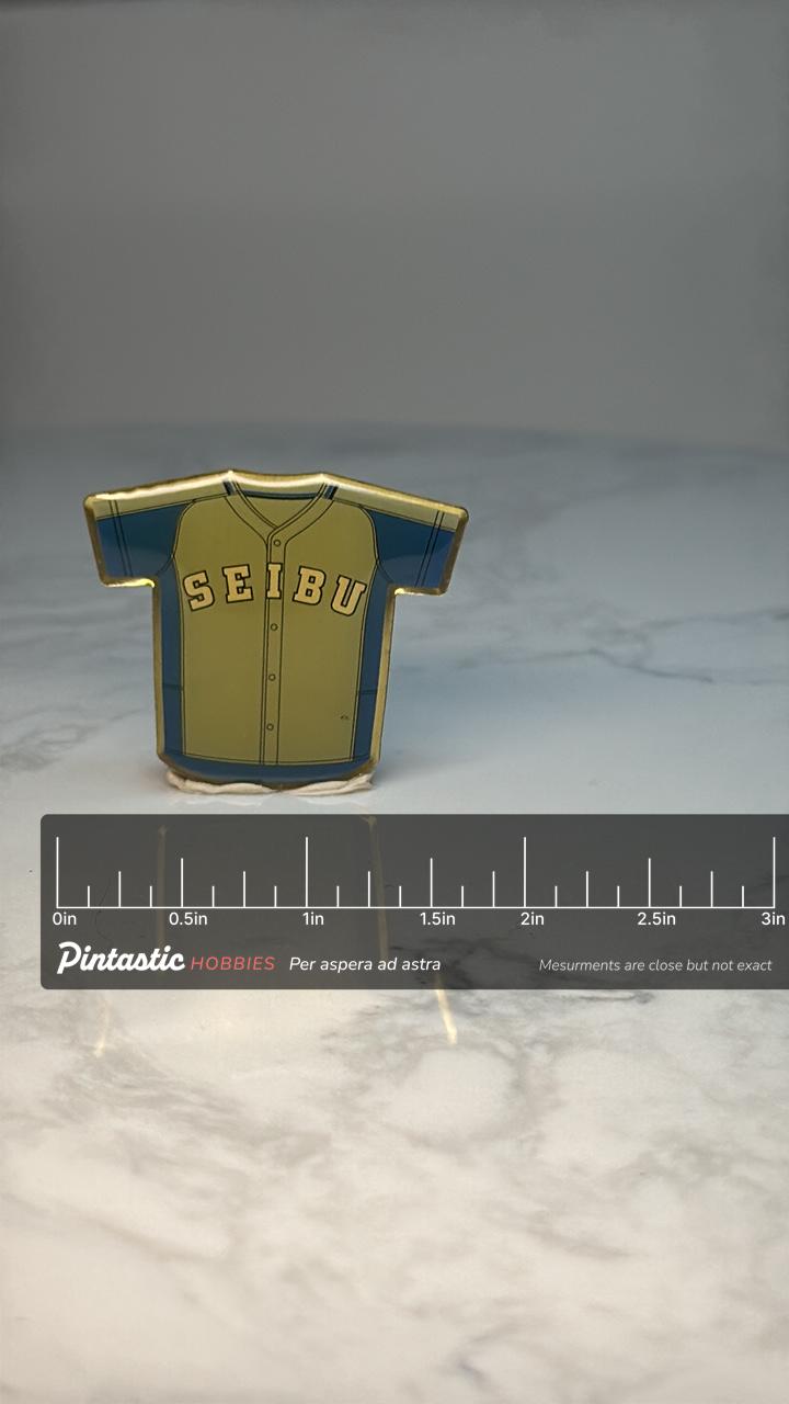Saitama Seibu Lions Baseball Jersey Pin: Yellow Blue Enamel - 1990s Sports Accessory with ruler overlay for size reference