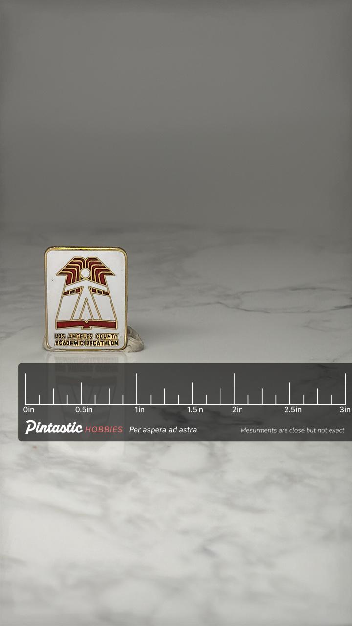 Los Angeles County Academic Decathlon Enamel Pin: Red Gold - Scholastic Award Accessory with ruler overlay for size reference