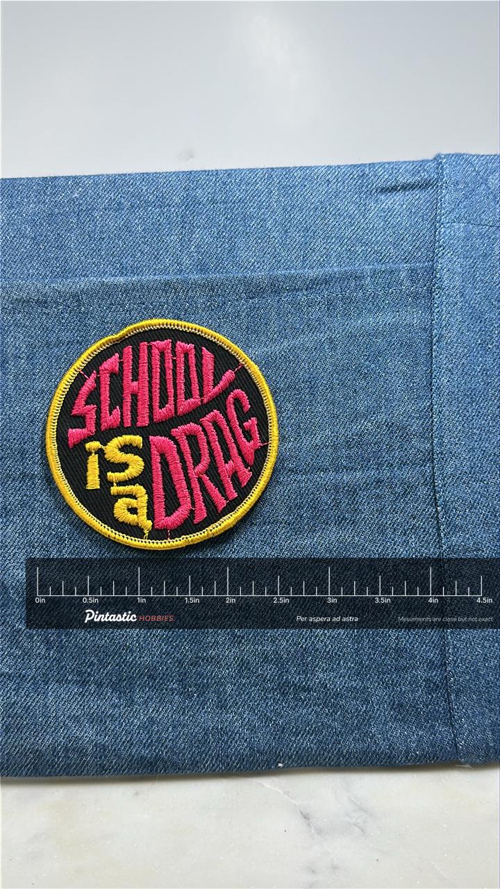 School is a Drag Collectable Patch: Pink & Yellow - Retro Novelty Accessory with ruler overlay for size reference