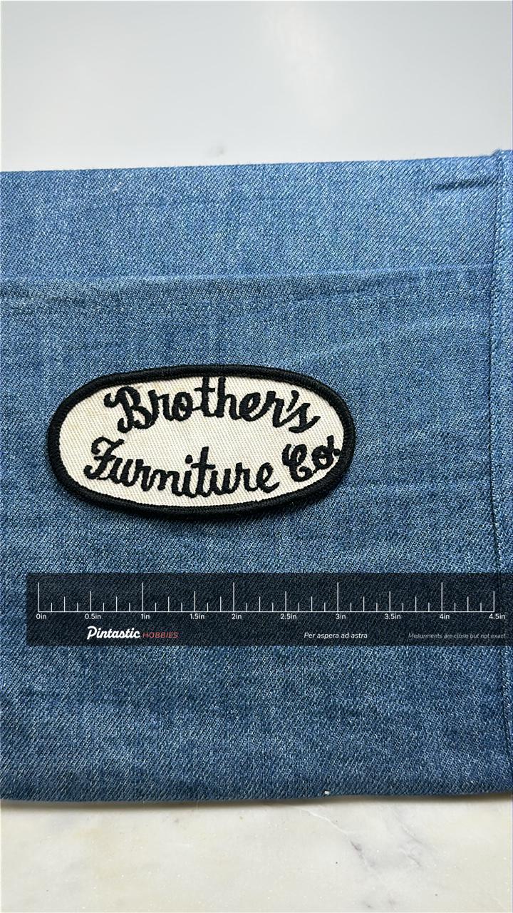 Brothers Furniture Co Collectable Patch: Black Oval - Vintage Company Accessory with ruler overlay for size reference