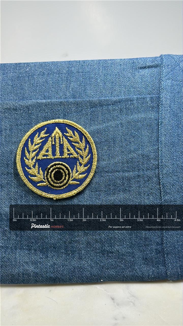 ATA Trapshooting Patch: Blue & Gold Emblem - Shooting Sports Accessory with ruler overlay for size reference