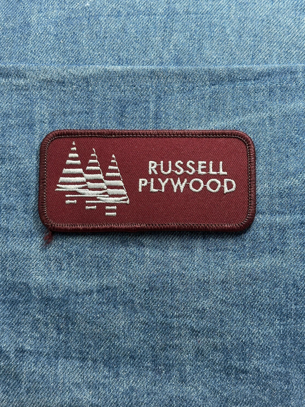 Russell Plywood Collectable Patch: Maroon Logo - Company Accessory