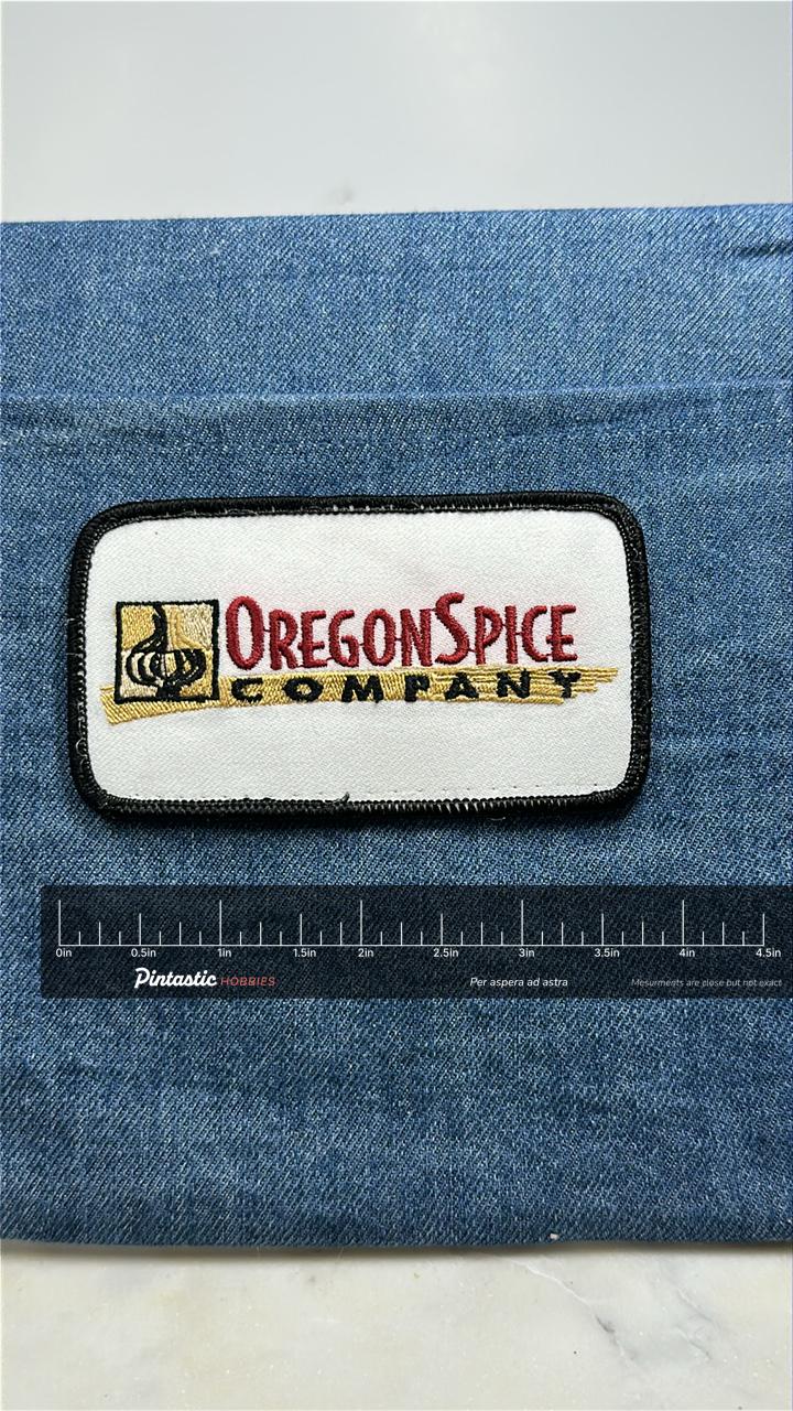 Oregon Spice Company Collectable Patch: Black Border - Corporate Logo Accessory with ruler overlay for size reference