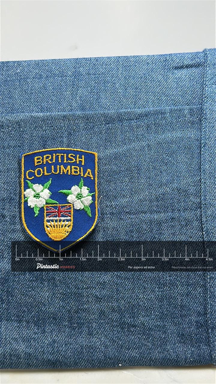 British Columbia Patch: Blue Shield Crest - Canada Souvenir Accessory with ruler overlay for size reference