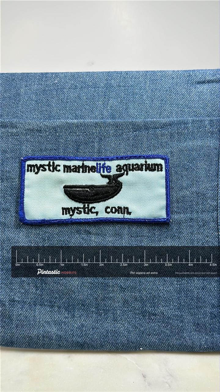 Mystic Marinelife Aquarium Collectable Patch: Blue Border - CT Souvenir Accessory with ruler overlay for size reference