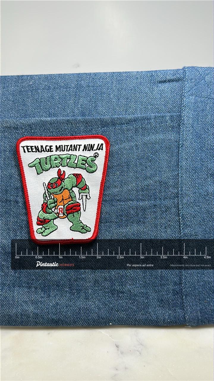 TMNT Raphael Collectable Patch: Red Border - 1990s Cartoon with ruler overlay for size reference