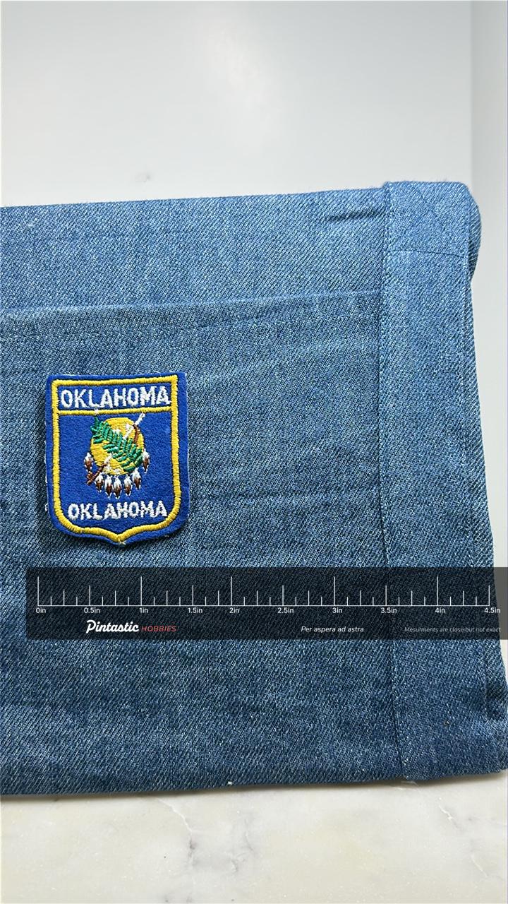 Oklahoma State Seal Collectable Patch: Blue Shield - Vintage Souvenir Accessory with ruler overlay for size reference