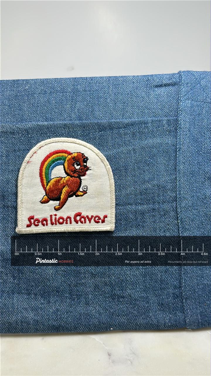 Vintage Sea Lion Caves: Rainbow Sea Lion - Coastal Travel Badge with ruler overlay for size reference