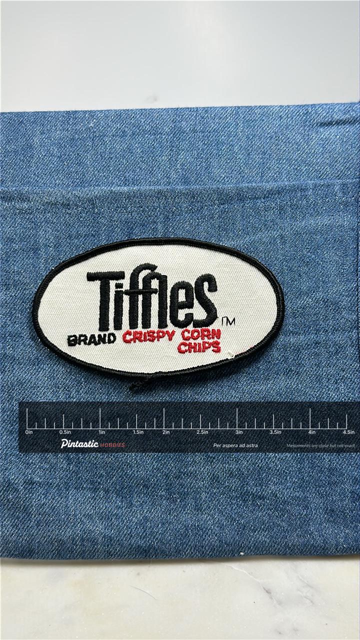 Tiffles Corn Chips Patch: White Oval Logo - Vintage Snack Accessory with ruler overlay for size reference
