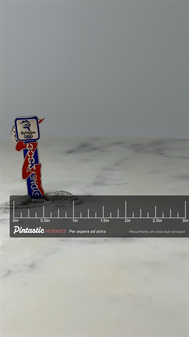 Vintage Sydney 2000 Olympics Lapel Pin: Red Blue Enamel - Sports Souvenir with ruler overlay for size reference