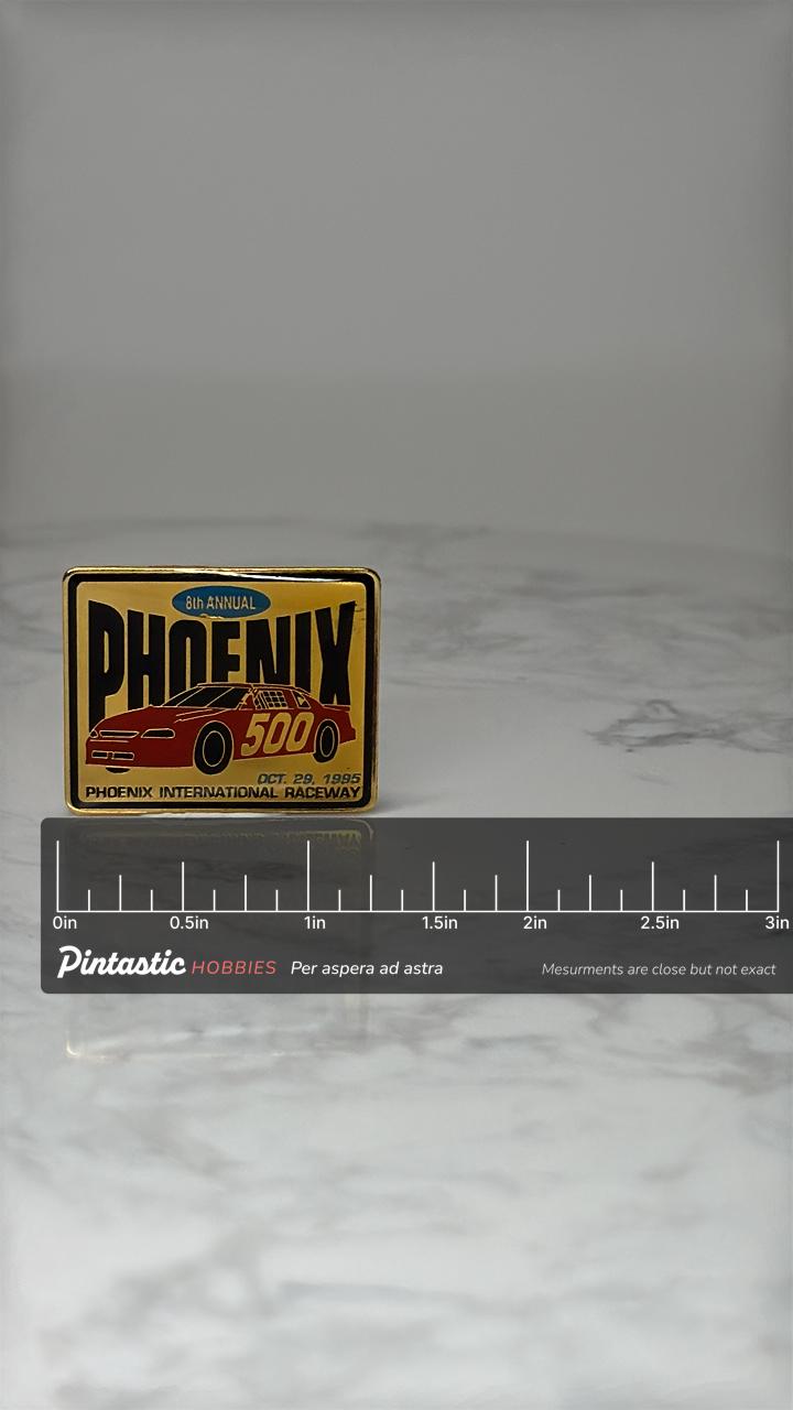 Vintage Phoenix 500 Lapel Pin: Red Enamel - 1995 Racing Souvenir with ruler overlay for size reference