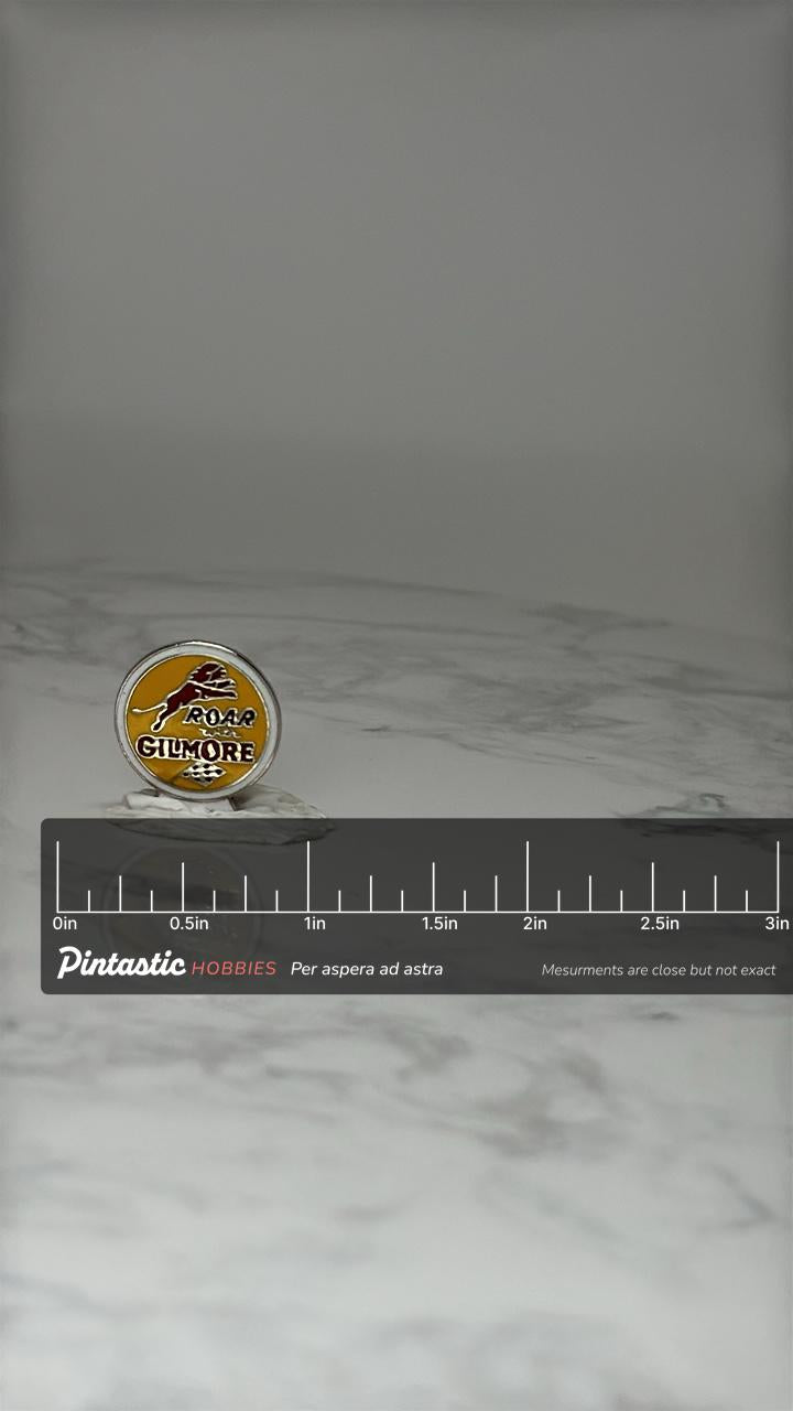 Vintage Gilmore Oil Advertising Pin: Yellow Enamel - Gas Station Era Accessory with ruler overlay for size reference