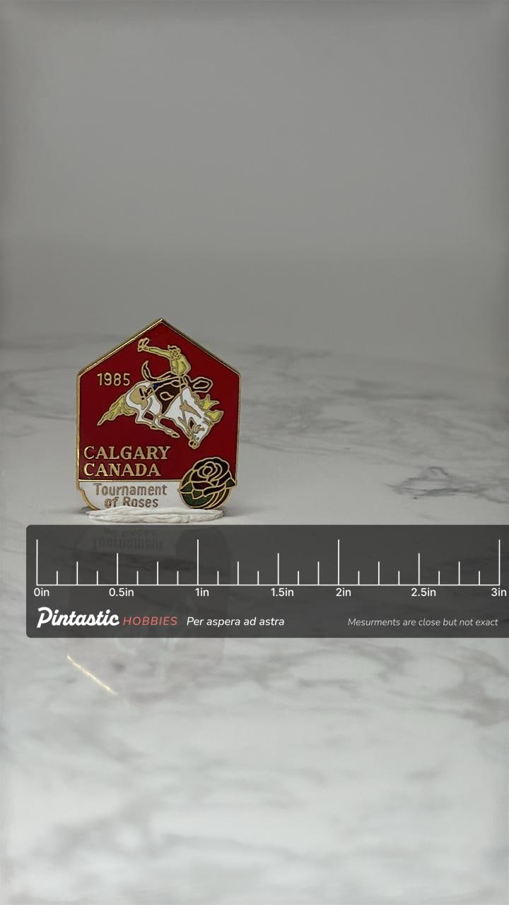 Vintage Calgary Canada Enamel Pin: Red Rodeo - 1985 Event Souvenir with ruler overlay for size reference
