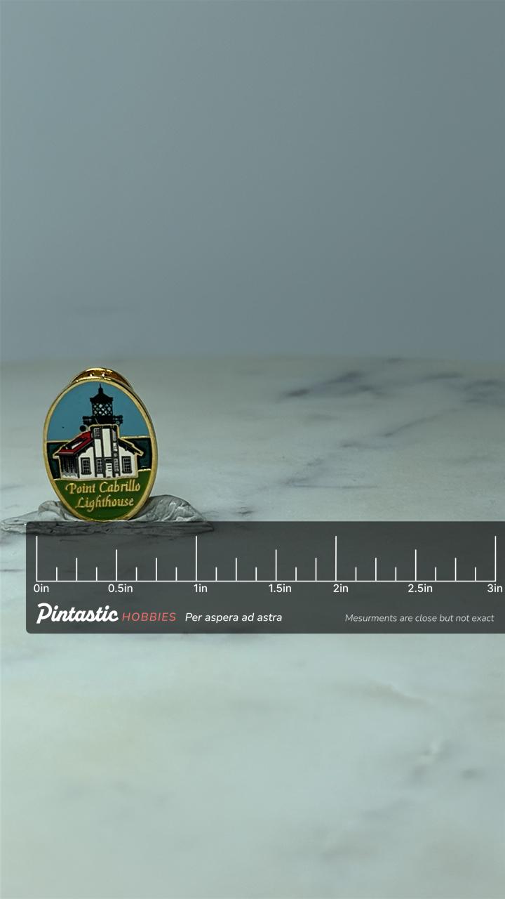 Vintage Point Cabrillo Lighthouse Souvenir Pin: Gold Tone - Coastal Travel Accessory with ruler overlay for size reference