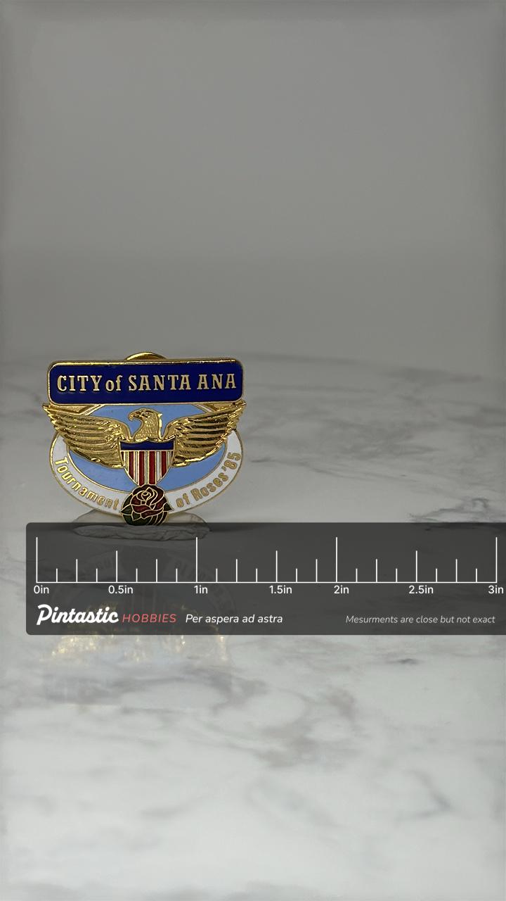 Vintage City of Santa Ana Enamel Pin: Gold Tone - 1985 Event Accessory with ruler overlay for size reference