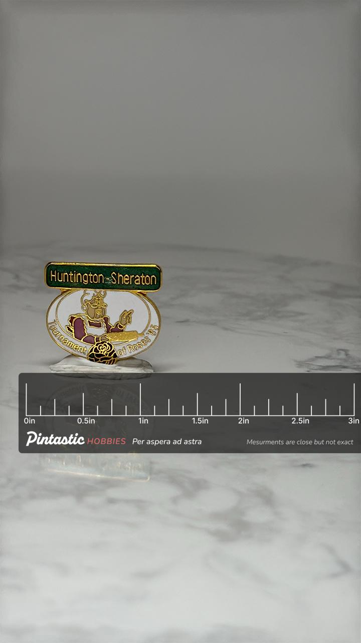Vintage Huntington Sheraton Lapel Pin: Gold Enamel - 1985 Rose Parade with ruler overlay for size reference