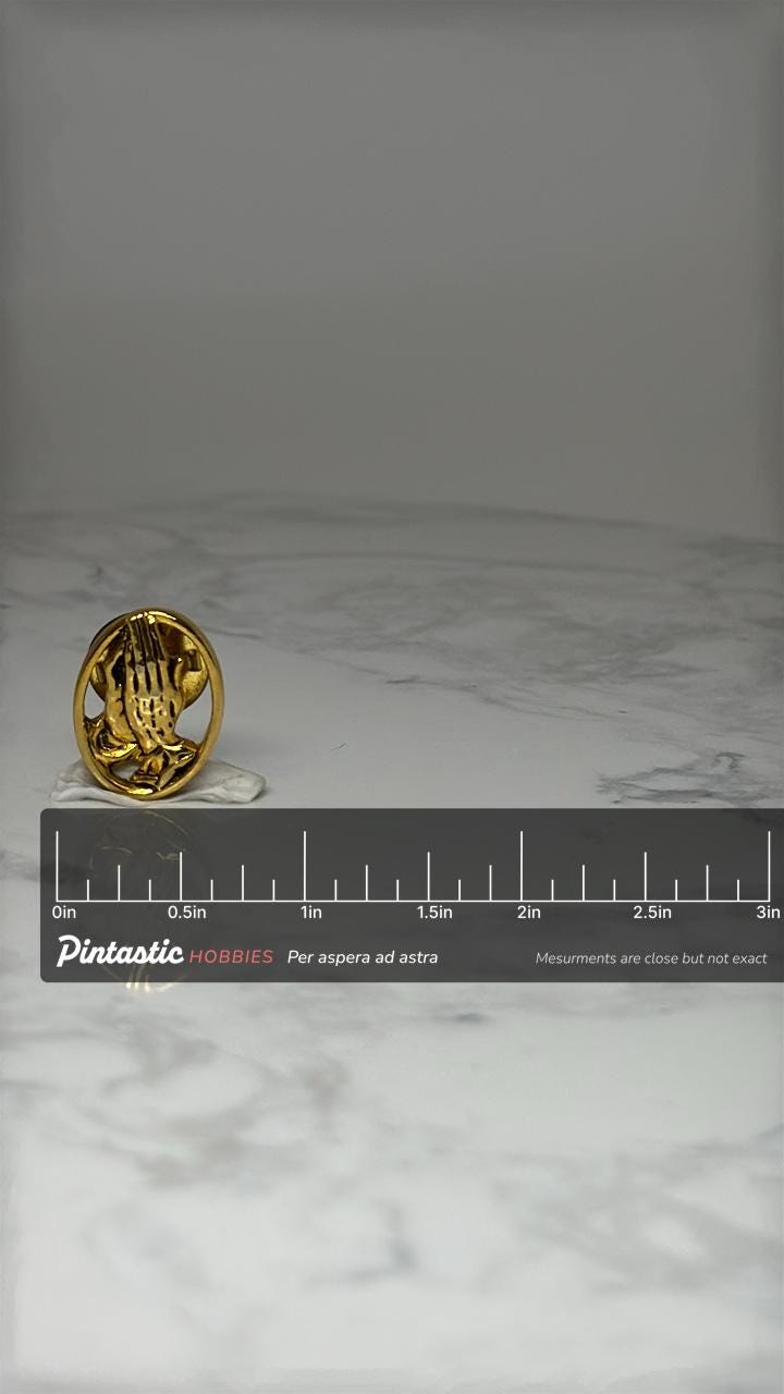 Vintage Praying Hands Lapel Pin: Gold Tone Relief - Religious Accessory with ruler overlay for size reference