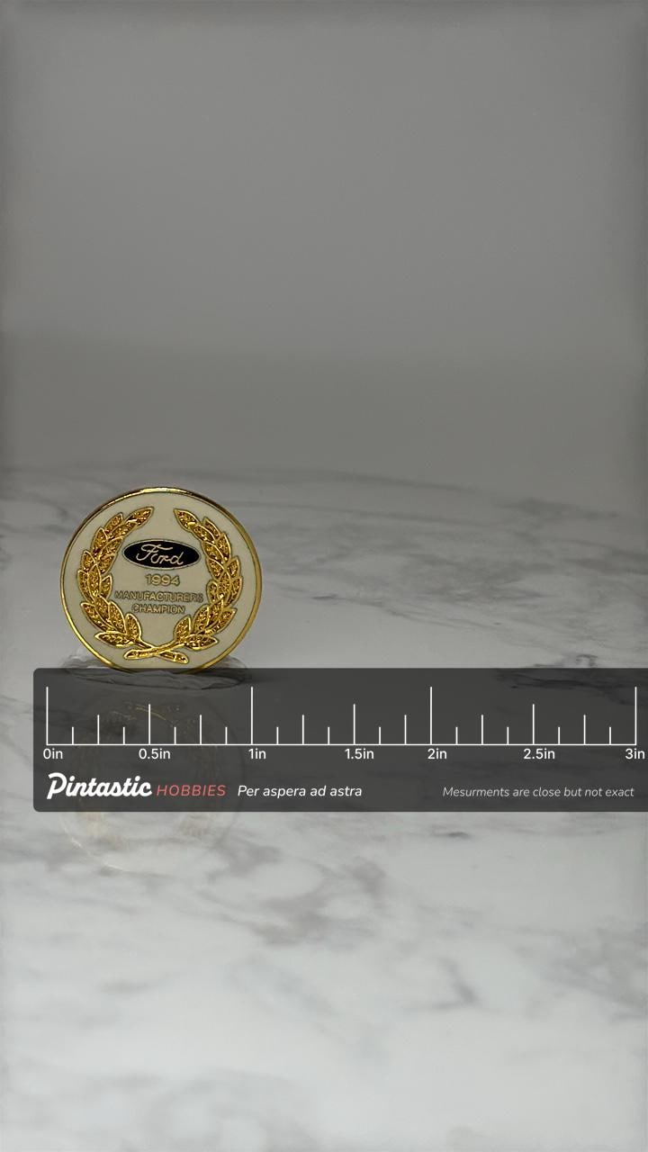 Vintage Ford 1994 Manufacturers Champion Pin: Gold Tone - Racing Accessory with ruler overlay for size reference