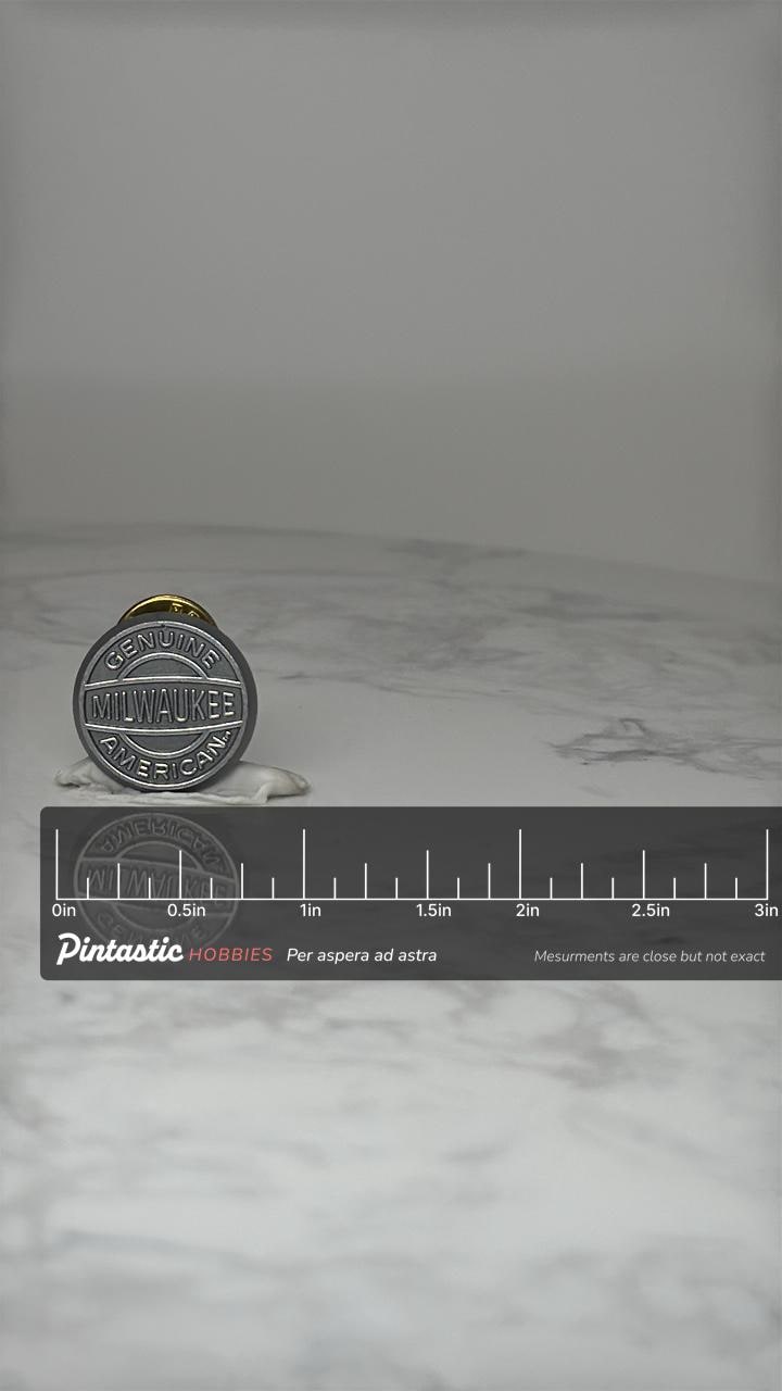 Vintage Milwaukee Tools Logo Pin: Silver Tone - American Brand Accessory with ruler overlay for size reference