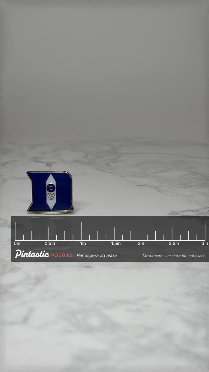 Vintage Duke Blue Devils Letter D Pin: Blue Enamel - College Sports Accessory with ruler overlay for size reference