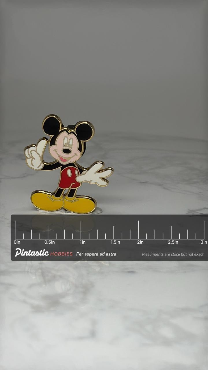 Vintage Mickey Mouse Character Pin: Gold Tone Enamel - Disney Accessory with ruler overlay for size reference
