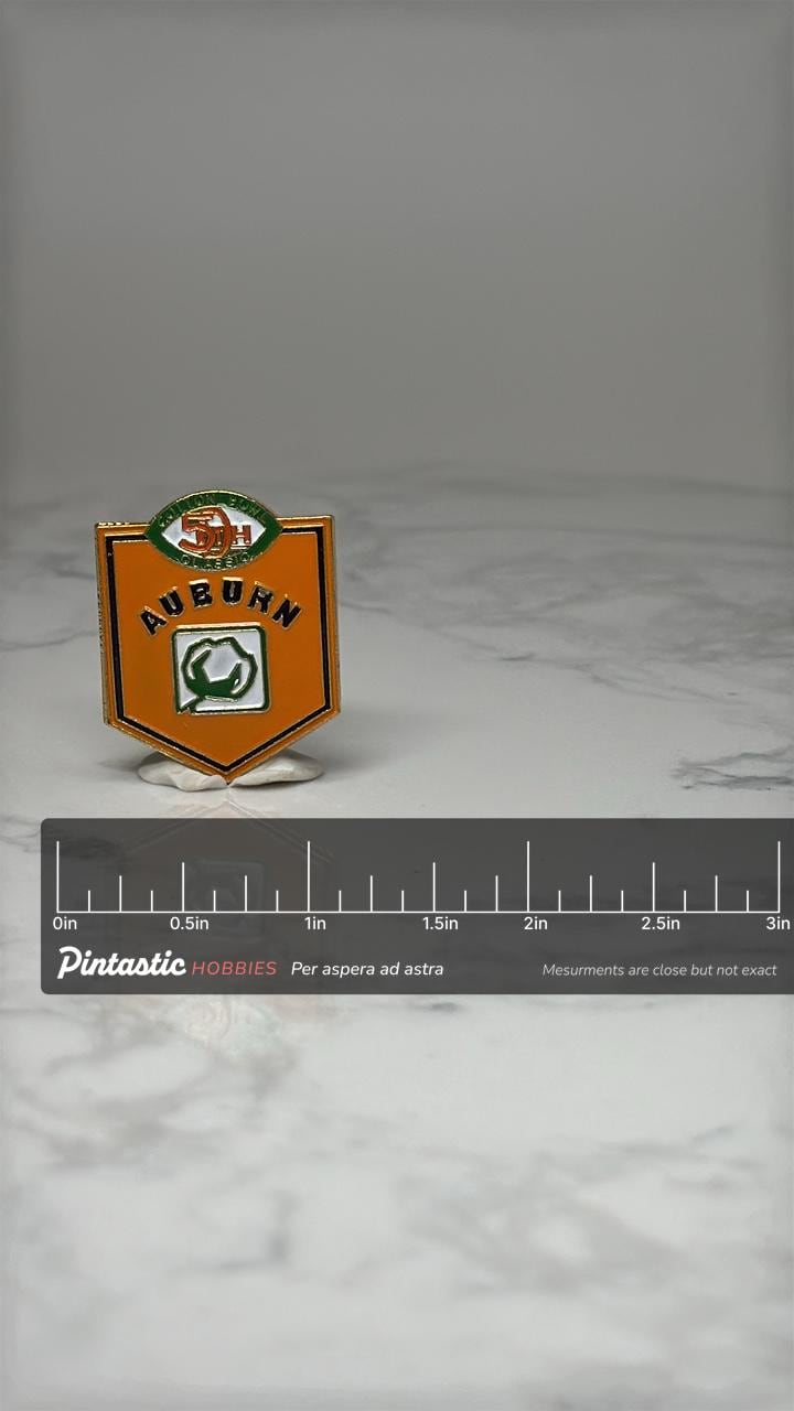 Vintage Auburn 5th Classic Enamel Pin: Orange Shield - Golf Event Accessory with ruler overlay for size reference