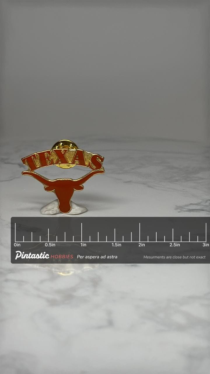 Vintage Texas Longhorn Enamel Pin: Red Gold Tone - State Souvenir Accessory with ruler overlay for size reference
