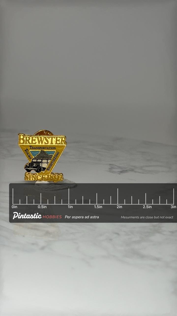 Vintage Brewster Transportation Lapel Pin: Gold Enamel - Since 1892 with ruler overlay for size reference