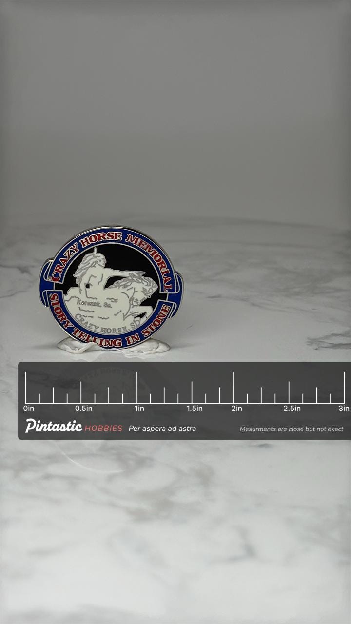 Vintage Crazy Horse Memorial Pin: Enamel Blue Red - South Dakota Souvenir Accessory with ruler overlay for size reference