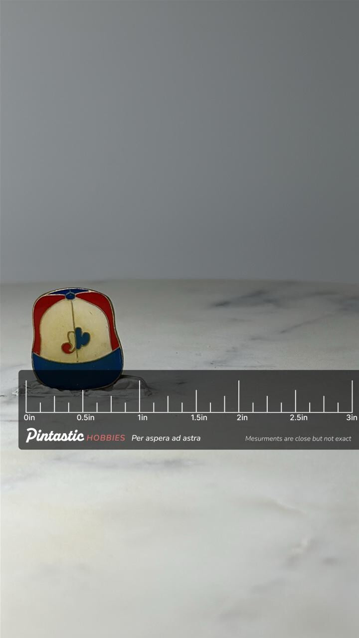 Vintage Montreal Expos Baseball Hat Pin: Red Blue Enamel - MLB Sports Accessory with ruler overlay for size reference