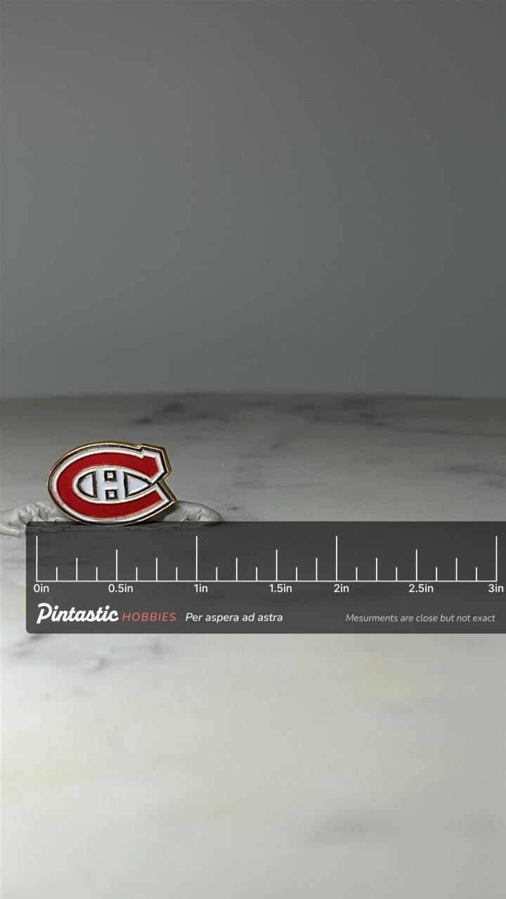 Vintage Montreal Canadiens Logo Pin: Red Enamel - NHL Hockey Accessory with ruler overlay for size reference