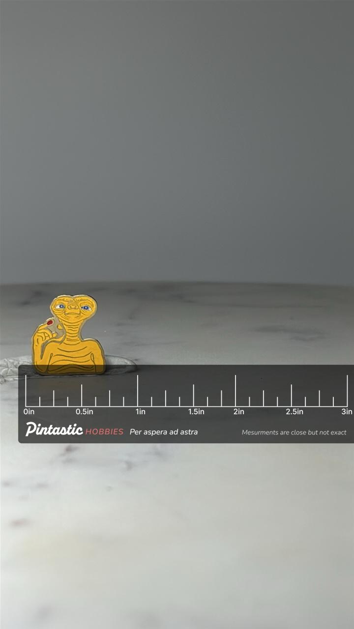 Vintage E.T. Movie Character Enamel Pin: Gold Tone - 1980s Sci Fi Accessory with ruler overlay for size reference