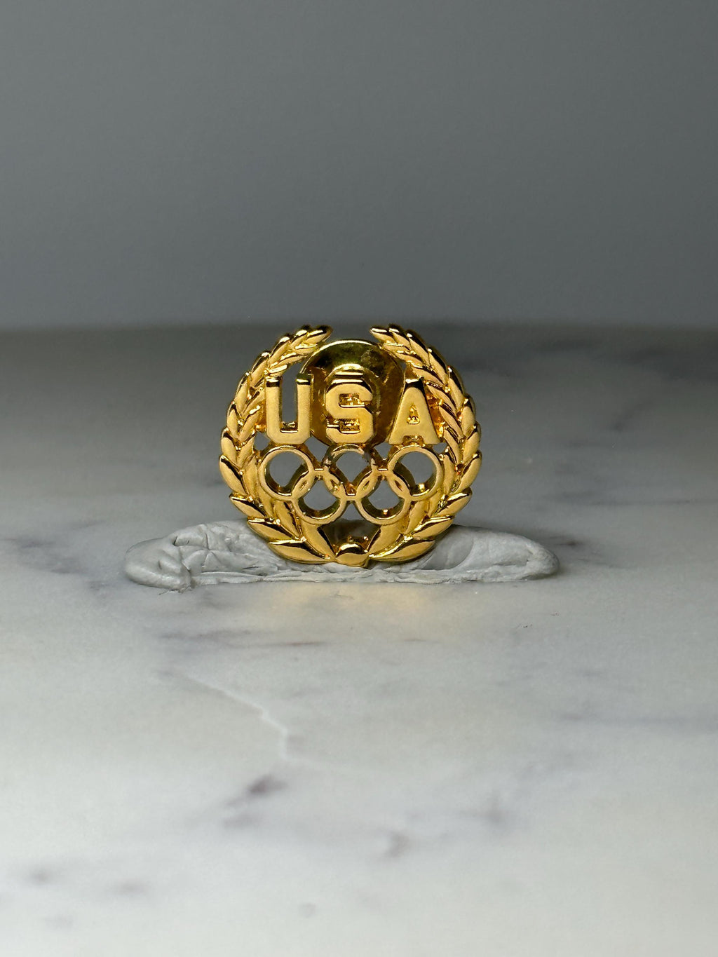 Vintage USA Olympic Rings Lapel Pin: Gold Tone - Patriotic Sports Accessory