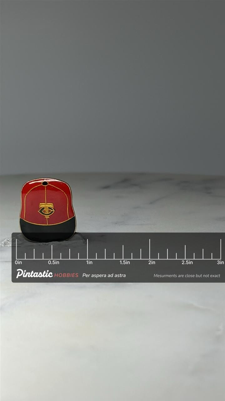 Vintage Minnesota Twins Baseball Cap Pin: Red Enamel - MLB Sports Accessory with ruler overlay for size reference