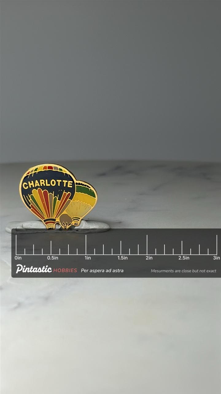Vintage Charlotte Hot Air Balloon Pin: Gold Tone Enamel - City Souvenir Accessory with ruler overlay for size reference