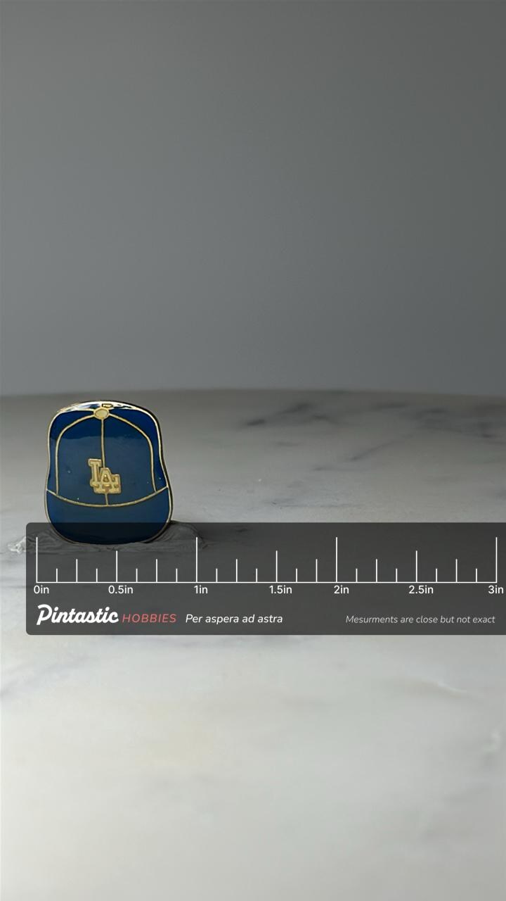 Vintage LA Dodgers Baseball Cap Pin: Blue & Gold Enamel - MLB Sports Accessory with ruler overlay for size reference