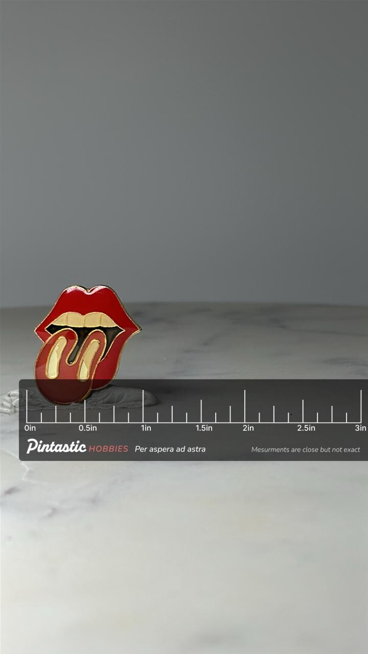 Vintage Rolling Stones Tongue Enamel Pin: Red & Gold - Rock Band Accessory with ruler overlay for size reference