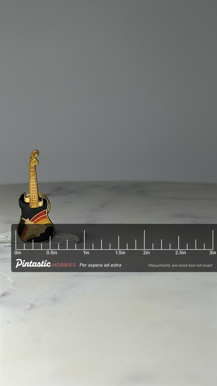 Vintage Electric Guitar Enamel Pin: Black & Rainbow - 1980s Music Accessory with ruler overlay for size reference